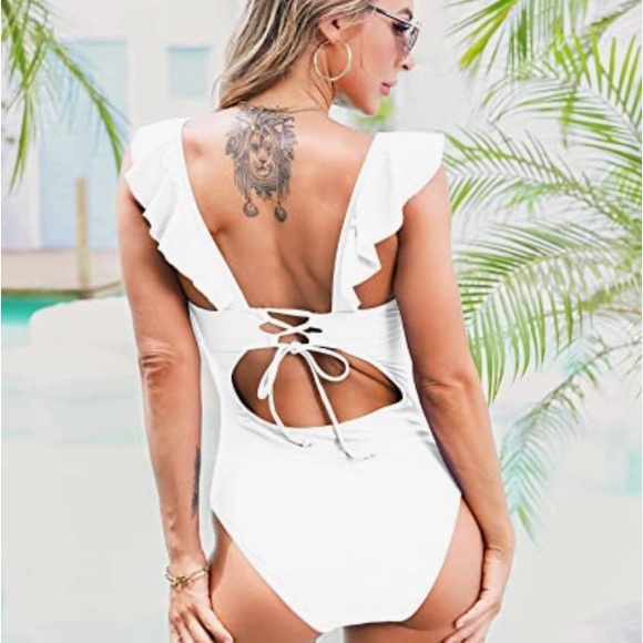 New white one piece bathing suit. - Picture 2 of 8